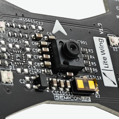 Close-up of a electronic circuit board with components and branding on a white background